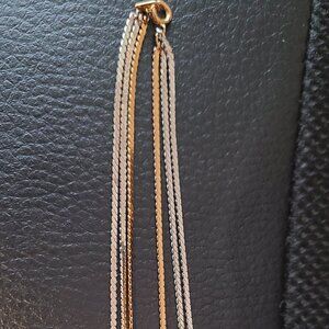 Bundle of three strands of two color necklace and 3-set of tri-colored bracelets